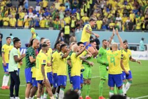 Brazil's players celebrate at the end of the World Cup round of 16 soccer match