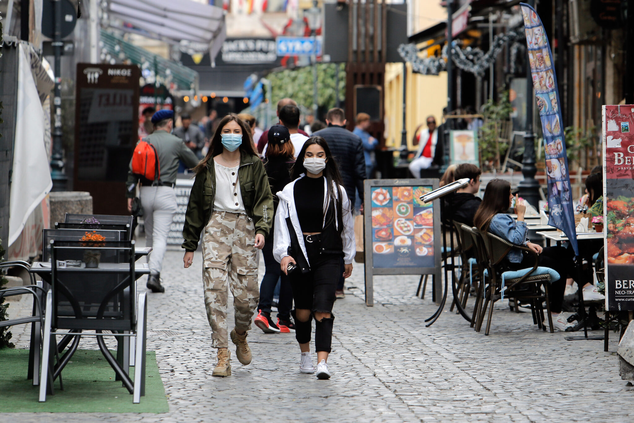 People walk past reopened