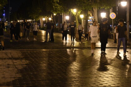 Tunisian people are seen on a street in Tunis