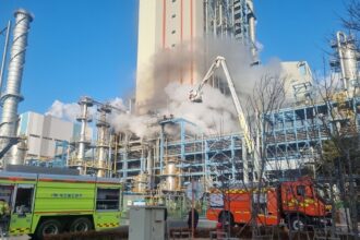 Firefighters put out a fire at a coal-fired power plant in Taean