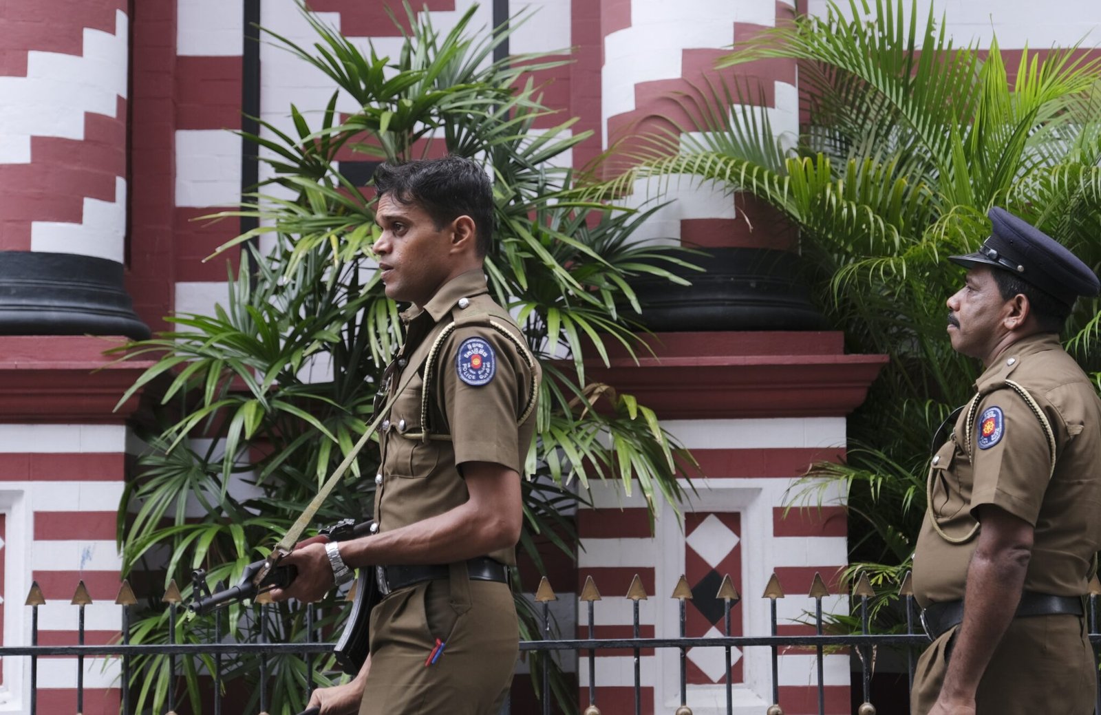 Policemen guard in Colombo