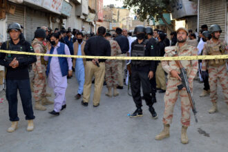 Security officers cordon off the blast site