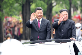 General Secretary of the Central Committee of the Communist Party of China (CPC) and Chinese President Xi Jinping and Kim Jong Un