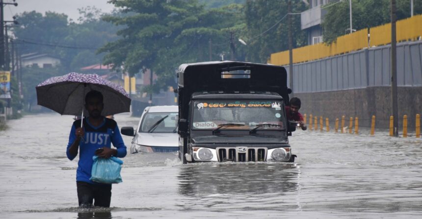 Vehicles are seen in flood water