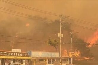 A wildfire rages on a hill in Gangneung, northeastern South Korea, on April 11, 2023