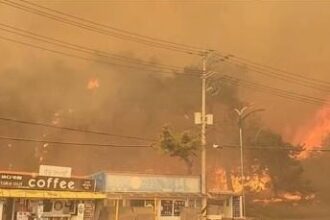 A wildfire rages on a hill in Gangneung, northeastern South Korea, on April 11, 2023