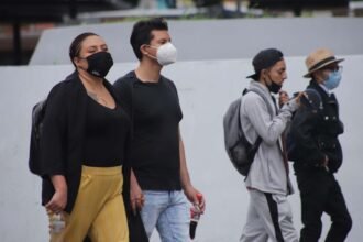 People are seen wearing masks in Mexico City