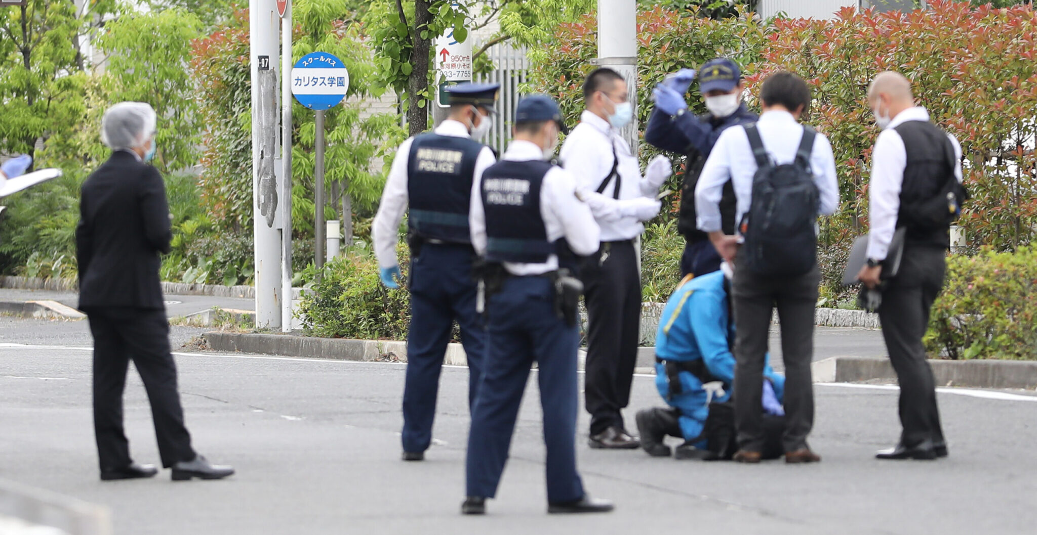 Police officers investigate