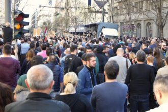 Protesters take part in a demonstration in Belgrade