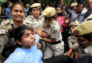 Wrestler Sakshi Malik being detained by Delhi police