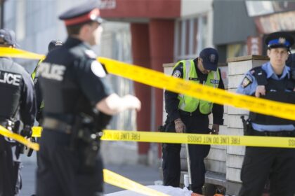 Policemen investigate
