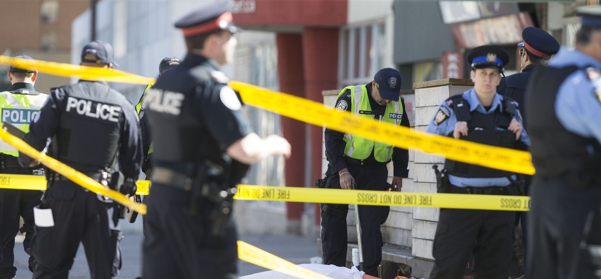 Policemen investigate