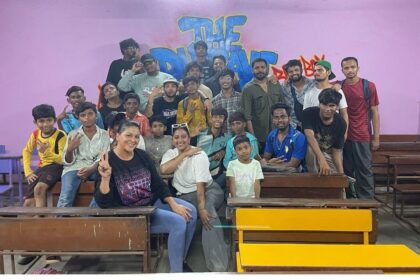 Singer Raja Kumari with children at Dharavi school in Mumbai