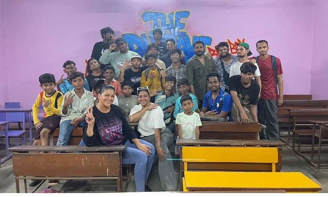 Singer Raja Kumari with children at Dharavi school in Mumbai