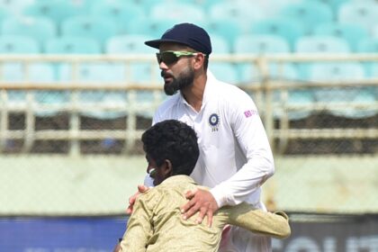 A Virat Kohli fan enters Dr. Y.S. Rajasekhara Reddy ACA-VDCA Cricket Stadium